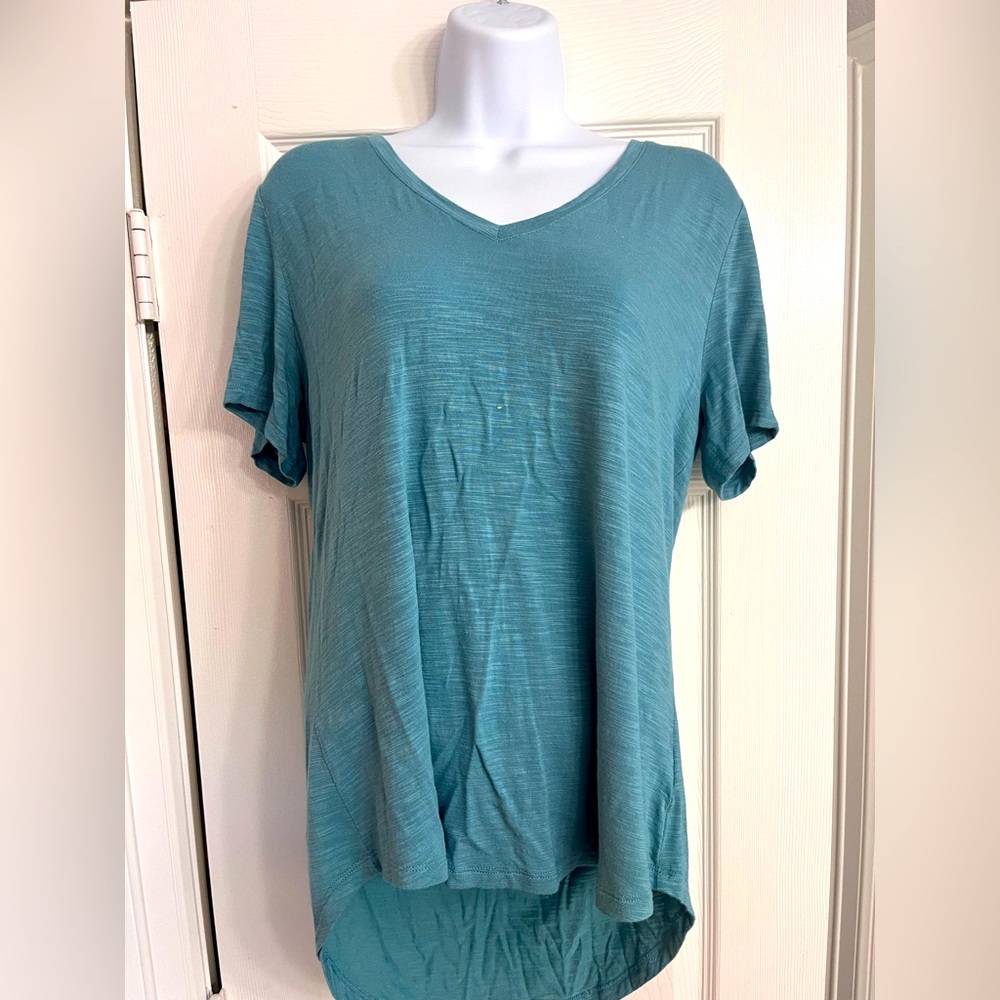 Light blue top, size M